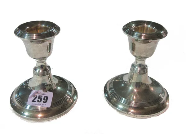 A pair of silver candlesticks, Birmingham 1915 (loaded). CAB