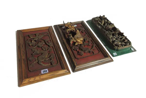 A group of three late 19th century Oriental fret carved gilded panels, (3). S10M