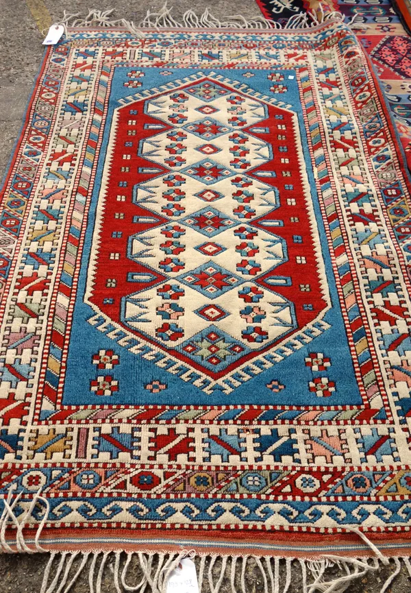 A Turkish rug, of Caucasian design, 190cm x 128cm. I5