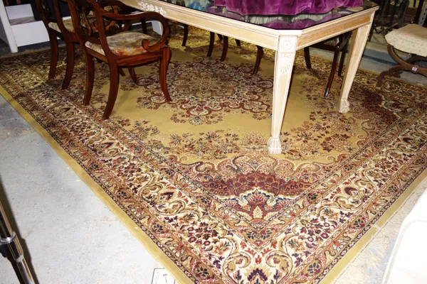 A machine made carpet, with golden field, 363cm x 275cm. H4