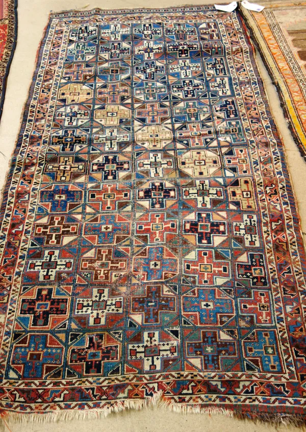 A kashgai rug, polychrome field with repeating cross medallion design and bird border 196cm x 105cm and a Belouch style mat, 120cm x 88cm, (2). K9