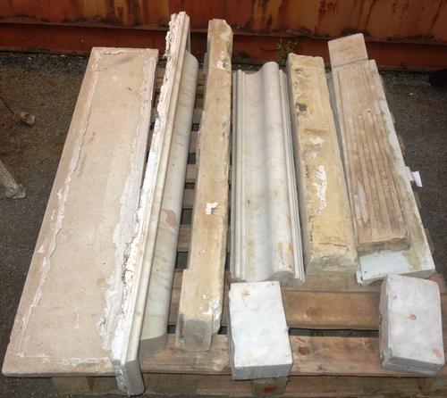 A marble and stone fire surround 132cm wide (a.f). OUT