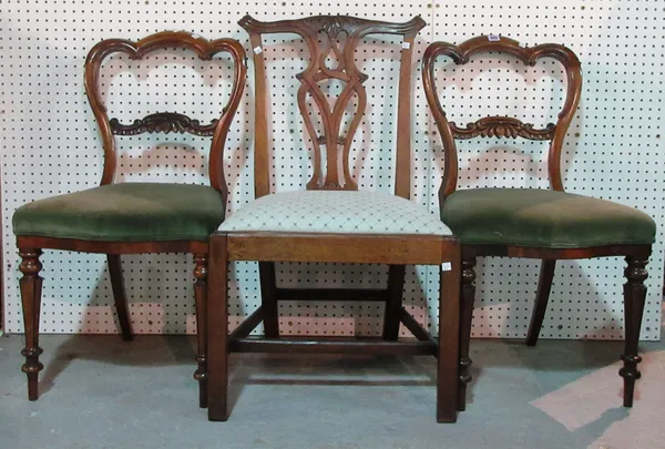 A pair of Victorian rosewood balloon back dining chairs and a mahogany dining chair, (3).  G3