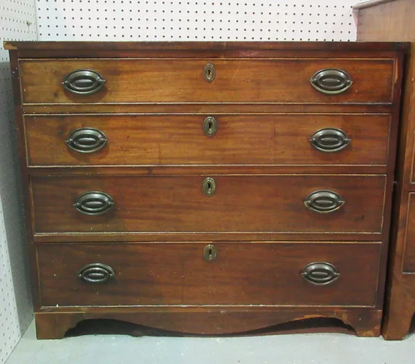 A late George III mahogany chest of four long drawers, with oval plate handles, 91cm wide x 75cm high.  C10