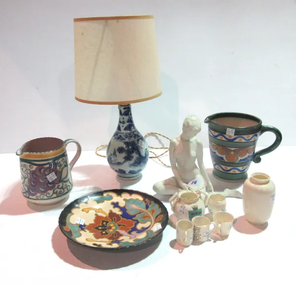 Ceramics, including; a German 'Keiser' bisque porcelain model of a woman, a Poole pottery jug, a Chinese blue and white lamp, Goss and sundry, (qty).