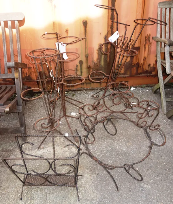 A group of early 20th century wrought iron pot stands of various sizes, (qty).  OUTSIDE
