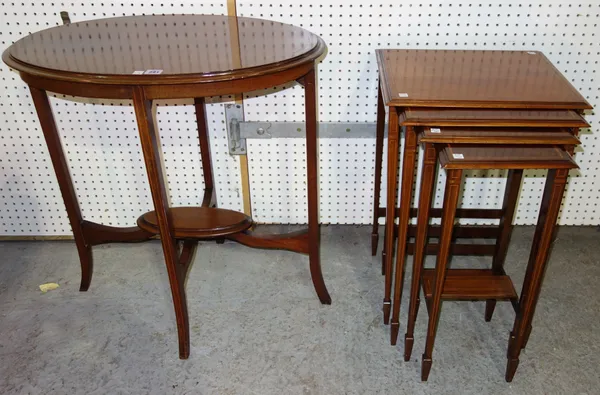An Edwardian mahogany oval occasional table and a nest of three tables, (2).  E7