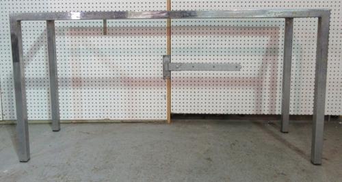 A 20th century chrome rectangular table (lacking top), 151cm wide.   E8