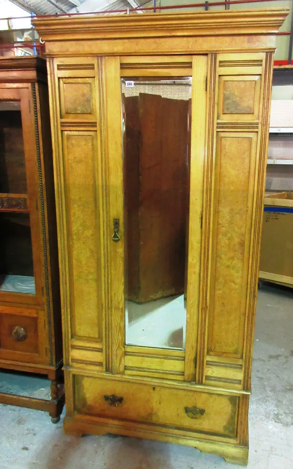 A late Victorian ash single door wardrobe with single drawer base, 100cm wide x 196cm high.   M8