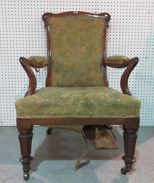 A William IV mahogany framed open armchair with outswept arms and lapet carved supports.   F5
