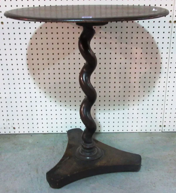An unusual 19th century oval occasional table, the barley-twist column on a triform base, 61cm wide. D10