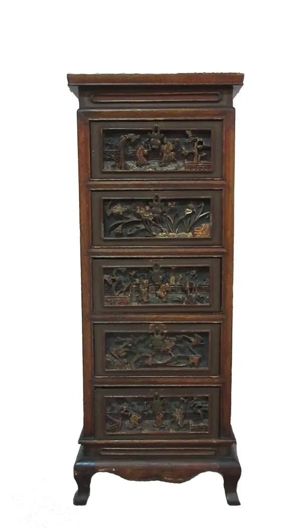 A Chinese hardwood five drawer pedestal with carved panels, 35cm wide x 89cm high.  C8