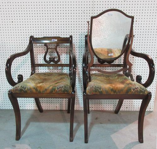A set of six brass inlaid Regency style lyre back dining chairs, on sabre supports, together with a shield shaped toilet mirror, (7).   H3