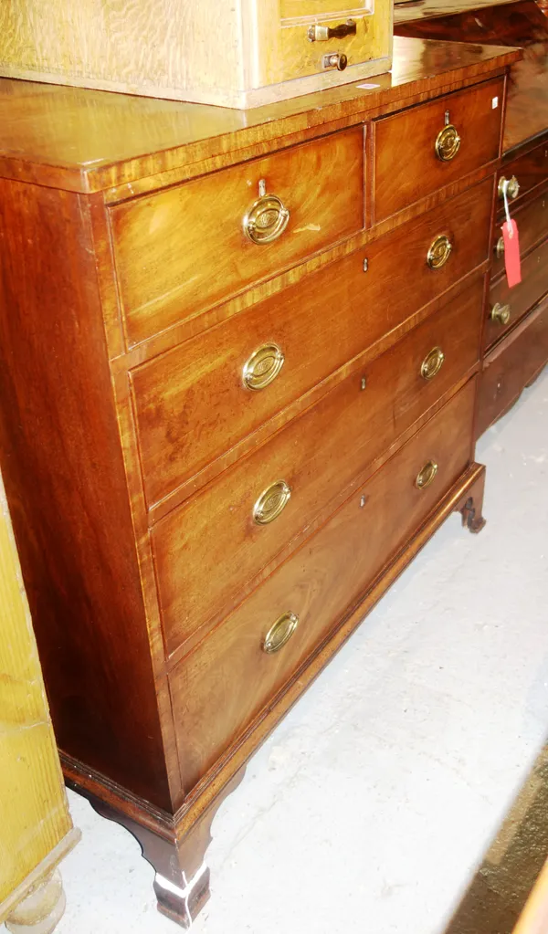 A George III mahogany straight fronted chest of two short and three long drawers, on ogee bracket feet, 104cm wide x 106cm high.   J9