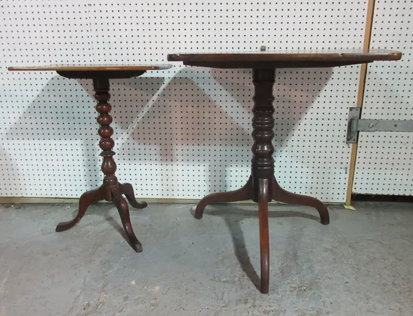 A 19th century mahogany rectangular tilt-top table, on turned column, 67cm wide x 72cm high and another smaller, 51cm wide x 67cm high, (2).   I7