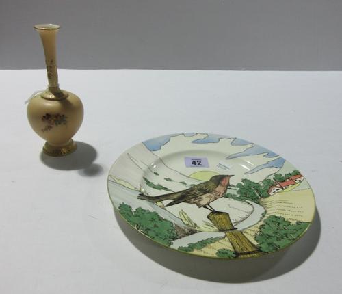 An unusual Minton pottery plate detailed with a robin against a landscape, impressed mark, 22.7cm diameter and a Royal Worcester blush ivory bottlenec