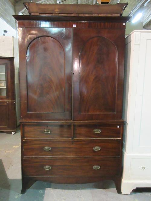 An early 19th century mahogany linen press, 126cm wide x 214cm high.  K8