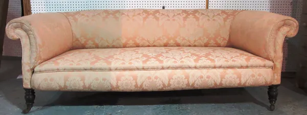 A Victorian mahogany Chesterfield sofa, with rollover arms, 196cm wide.   I6