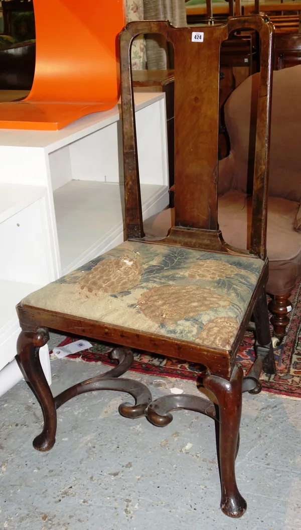 A George II walnut side chair, on cabriole legs united by wavy stretcher.  C6