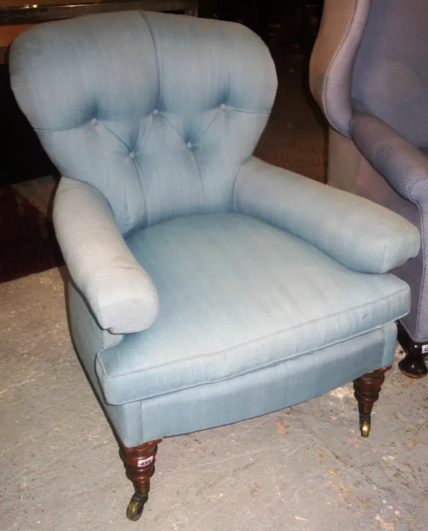 A Victorian walnut framed upholstered armchair.  F8