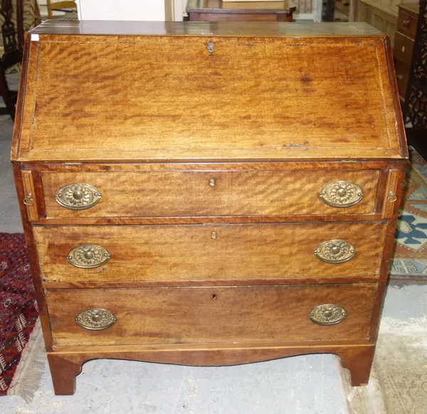 A George III mahogany bureau, with fitted interior over three long graduated drawers, 97cm wide.   G9