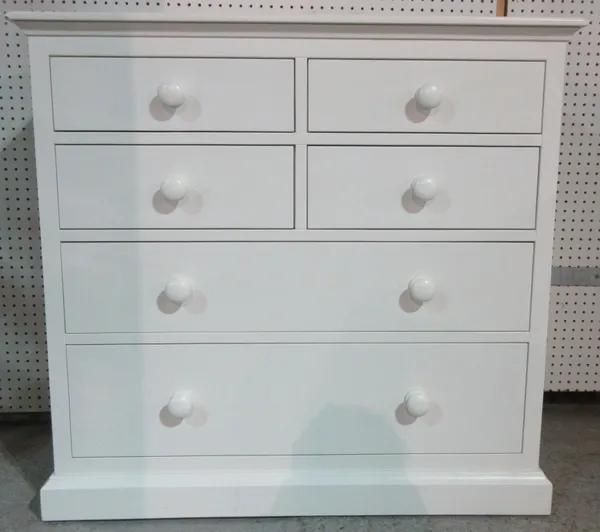 A 20th century white painted chest of two short and three long drawers, on a plinth base, 104cm wide.H9