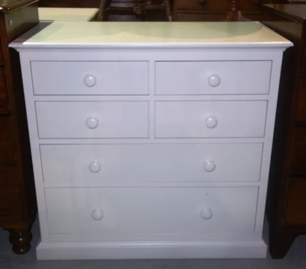 A 20th century white painted chest of four short and two long drawers, on plinth base, 104cm wide.  I9