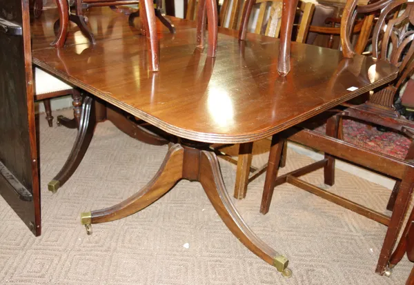A Regency style mahogany 'D' end extending dining table with one extra leaf, 99cm wide x 182cm long x 127cm long extended.    G7