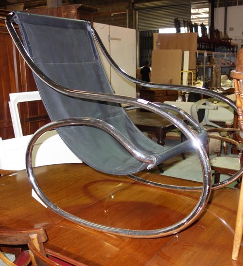A 20th century tubular steel framed easy chair, 60cm wide.  J8