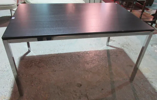 A late 20th century chrome dining table, with black veneer top, 135cm wide x 76cm high.  K4