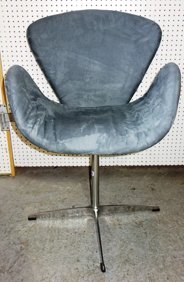 A 20th century swan shaped swivel chair, on chrome four point base, 70cm wide.  I8