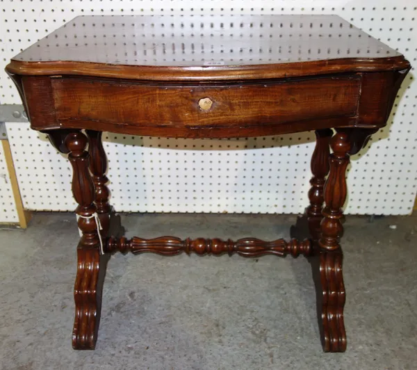 A 19th century Continental small mahogany drop-flap sofa table, with serpentine frieze drawers, 68cm wide.  J7