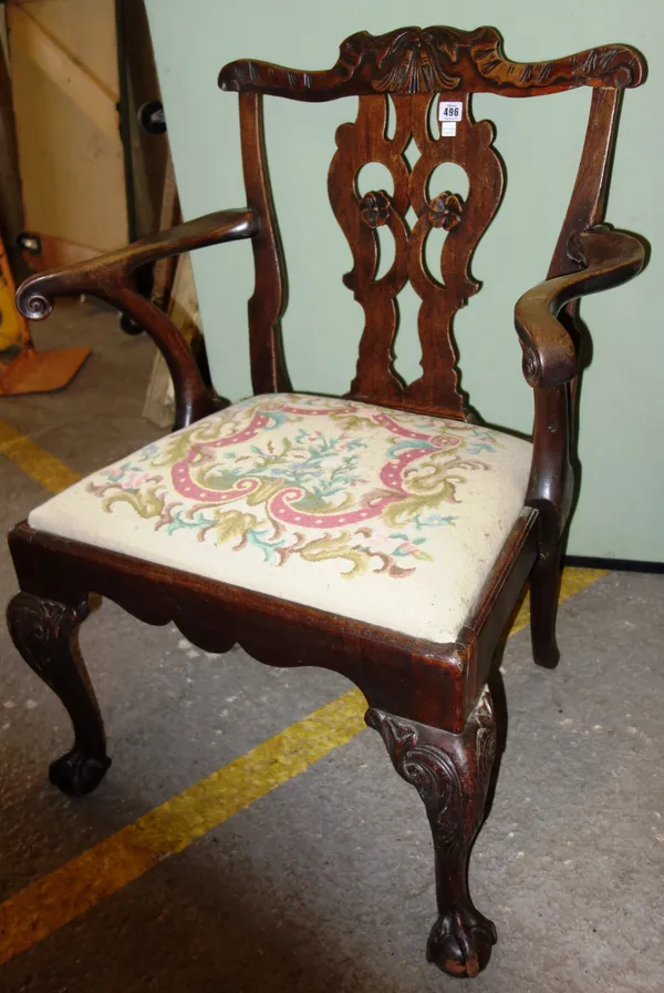A George III mahogany carver chair on ball and claw feet, 66cm wide.   H6