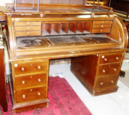 A 19th century mahogany cylinder bureau, with fitted interior and pedestal base, 154cm wide.  H8