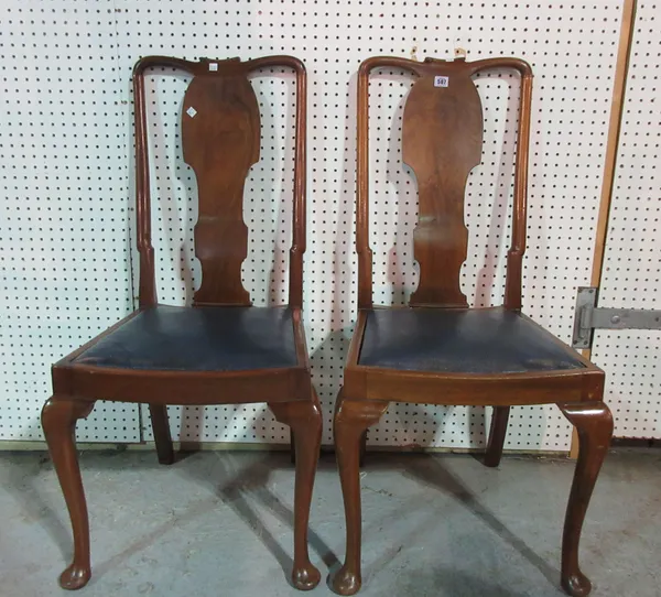 A set of six Queen Anne style walnut vase back dining chairs, (6).   J8