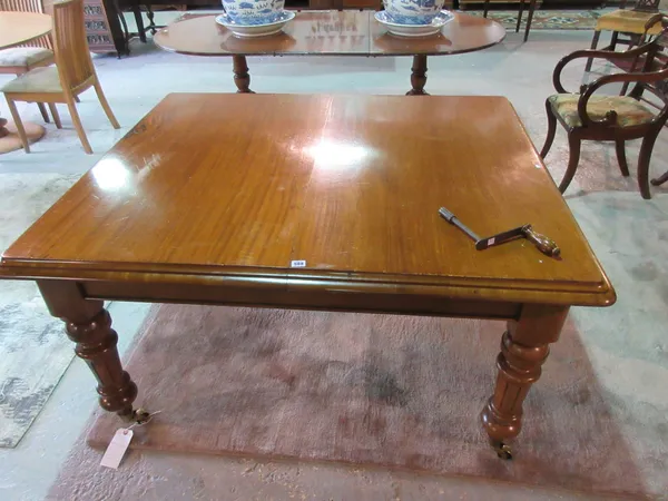 A 19th century mahogany extending dining table, with single leaf, 121cm wide x 140cm long, 203cm long fully extended.  J8