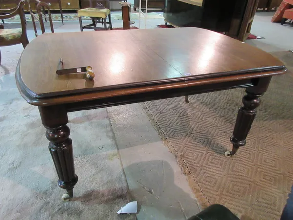 A 19th century mahogany extending dining table, with single leaf, 103cm wide x 150cm long, 193cm long fully extended.  F7