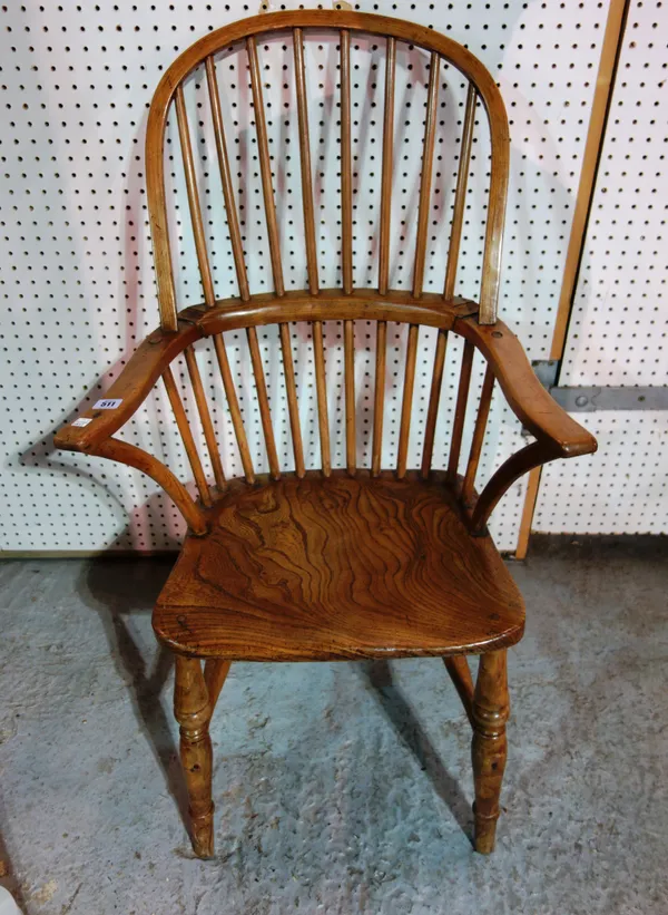 A 19th century ash and elm Windsor armchair.   C4
