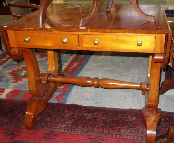 A Biedermeier mahogany two drawer sofa table, on lyre supports, 91cm wide.   I7