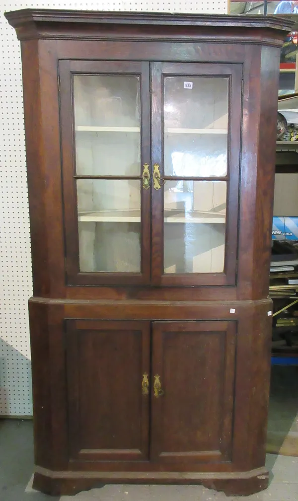 A George III oak double height corner display cabinet cupboard, 104cm wide x 200cm high.  M9