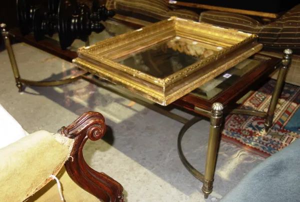 A 20th century oak and brass rectangular coffee table, 145cm wide and a gilt framed wall mirror, 54cm wide, (2).  E6 & A2