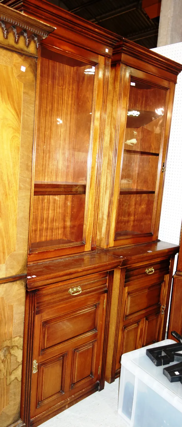 A pair of 18th century style mahogany tall narrow display cabinet cupboards each with single glazed door over single drawer cupboard, 71cm wide x 220c