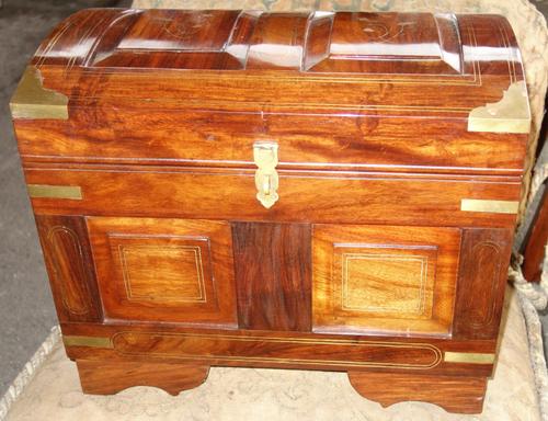 A 20th century brass inlaid hardwood domed top trunk, 46cm wide.   F5