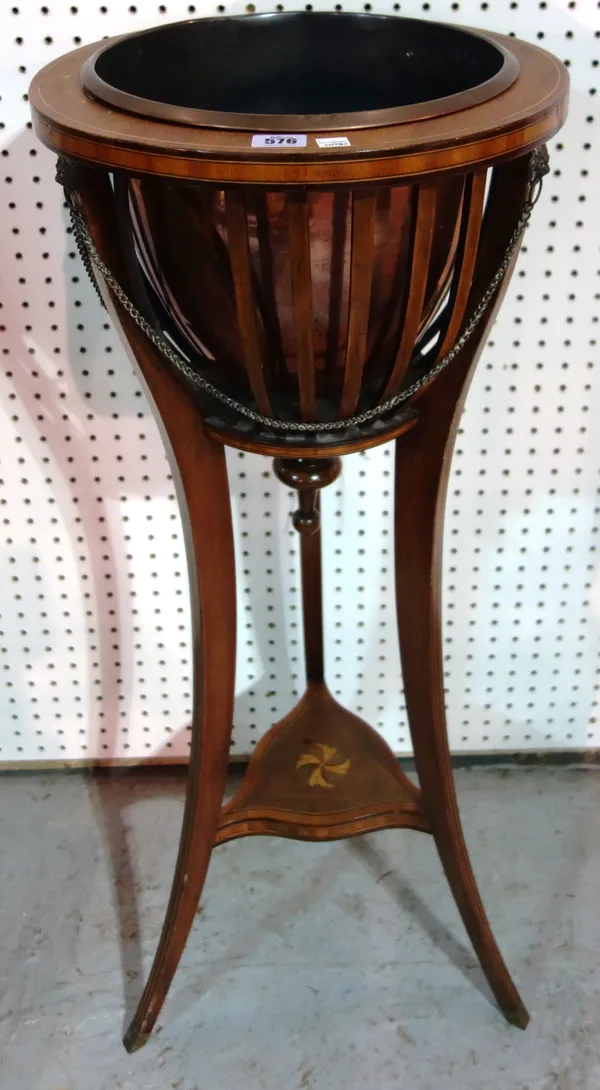 An Edwardian inlaid mahogany jardiniere with slatted body on three splayed supports, 38cm wide x 91cm high and a nest of three mahogany occasional tab