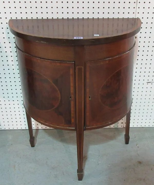 An Edwardian mahogany demi-lune side table, 56cm wide.     A10