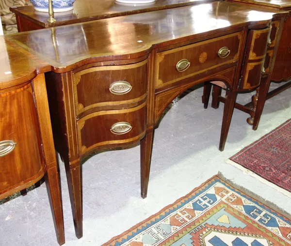 A George III mahogany and satinwood banded serpentine sideboard, 168cm wide x 91cm high.  E9
