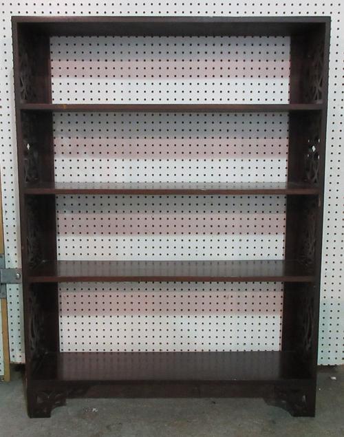 A George III mahogany open bookcase, with pierced fretwork sides, 91cm wide x 123cm high.  I7