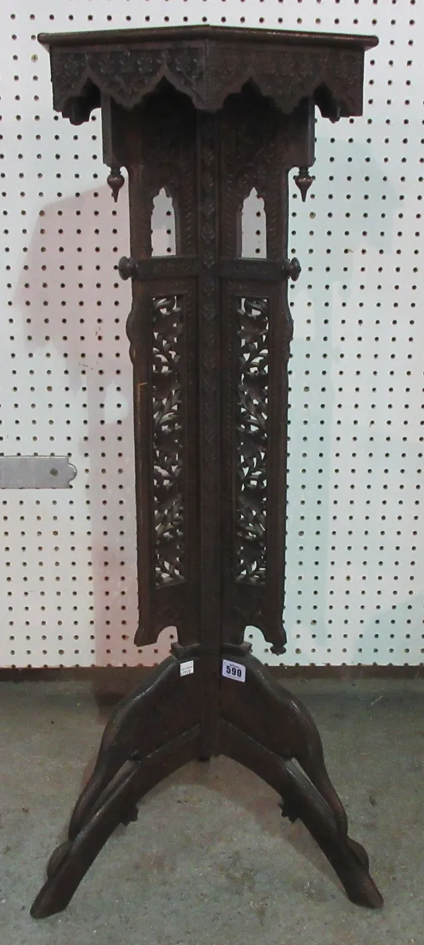 A late 19th century Indian torchere stand with pierced and carved decoration, 98cm high.  D6