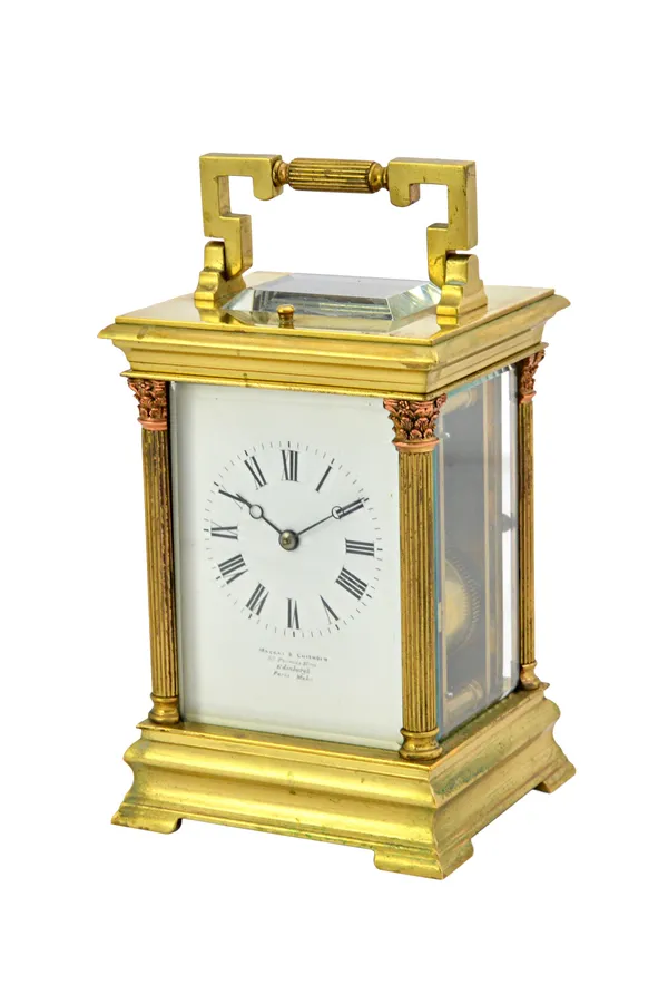 A French hour repeating gilt brass cased carriage clock by E. Maurice & Co, late 19th century, the white enamel dial plate set with Roman numerals and