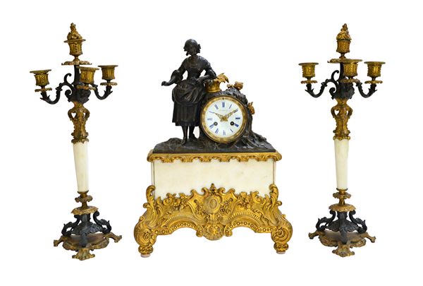 A French bronze, ormolu and white marble mantel clock garniture, late 19th century, with a female figure against an enamelled drum case, enclosing a t